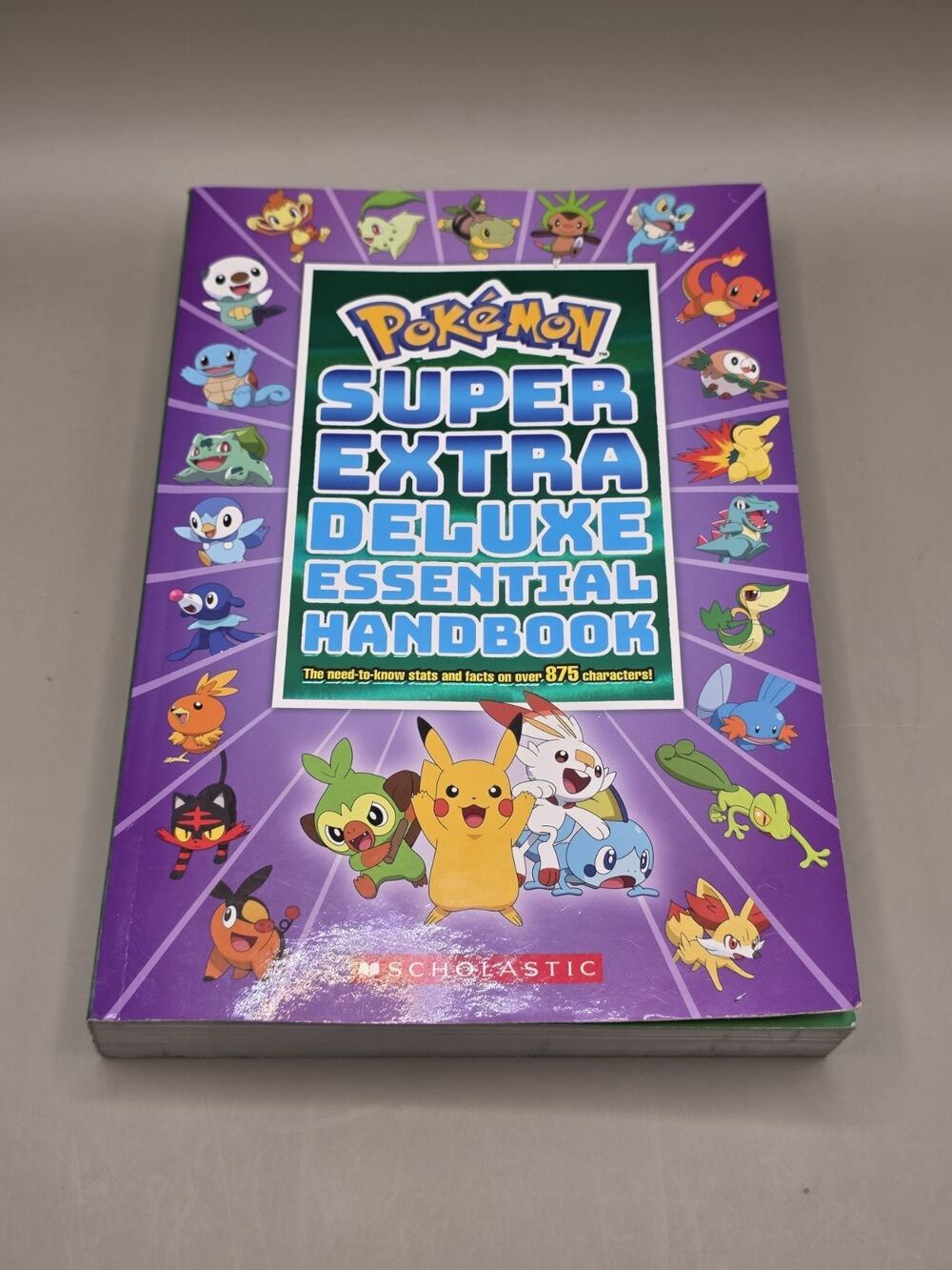 Super Extra Deluxe Essential Handbook: the Need-To-Know Stats and Facts on over